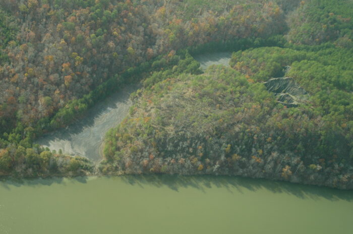 Erosion from the Maxine Mine site fills a tributary and pollutes the Locust Fork of the Black Warrior River. 